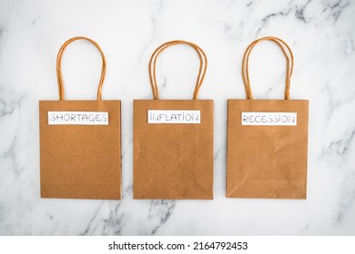 Economy After Covid Conceptual Image, Inflation Shortages And Recession Texts On Shopping Bags, 