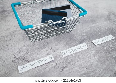 Economy After Covid Conceptual Image, Inflation Shortages And Recession Texts With Shopping Basket And Payment Cards