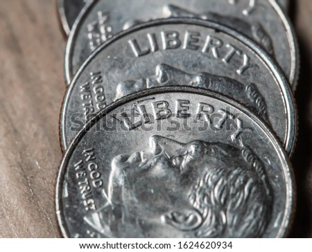 Economy, coronavirus, Us Dollar. Coin Bank, One Dime. Photograph of a group of American dimes.