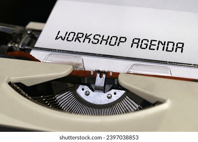 Economy and finance concept. The text is printed on a typewriter - Workshop Agenda - Powered by Shutterstock