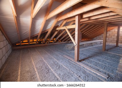 Ecowool insulation is poured in the attic. Eco-freandly clean