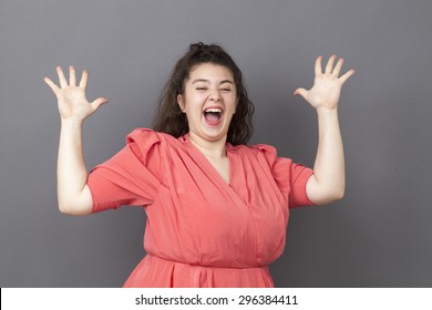 Ecstatic 20s Big Woman Acting Thrilled, Wearing Colorful Vintage Dress, Expressing Joy And Excitement With Hands And Face