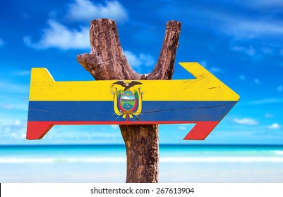 Ecuador Flag Wooden Sign With Beach Background