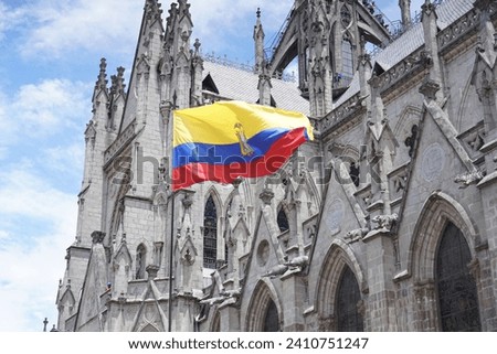 Ecuadorian flag flying in front of the basicilica de Voto nacional in Quito, Ecuador