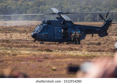 EDE, NETHERLANDS - SEPTEMBER 19TH, 2019: Dutch Defence Helicopter Command Show At Airborne Ede. Cougar Helicopter Landing On The Ginkel Heath.