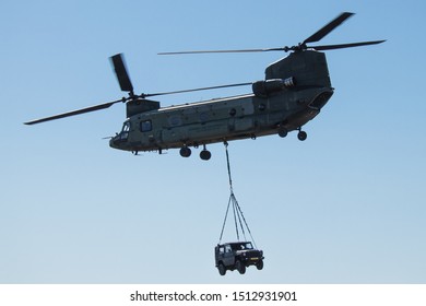EDE, NETHERLANDS - SEPTEMBER 19TH, 2019: Dutch Defence Helicopter Command Show From The Royal Dutch Air Force Near Arnhem. Chinook Heli Jeep Transportation.