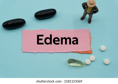 Edema.The word is written on a slip of colored paper. health terms, health care words, medical terminology. wellness Buzzwords. disease acronyms. - Shutterstock ID 2181153369