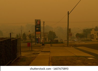 Eden, Australia - December 31, 2019: Thick Orange Haze Envelopes The Desolate Town Of Eden, New South Wales, As Bushfires Block All Roads Into The Region.