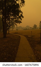 Eden, Australia - December 31, 2019: Thick Orange Haze Envelopes The Desolate Town Of Eden, New South Wales, As Bushfires Block All Roads Into The Region.