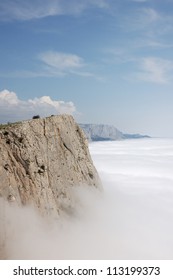 Edge Of The Cliff Above The Clouds