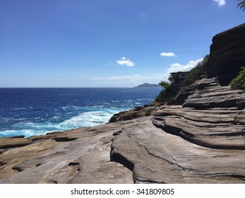 The Edge Of A Rocky Cliff In Portlock On Oahu.