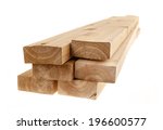 Edge of six cedar two by four wood boards on white background