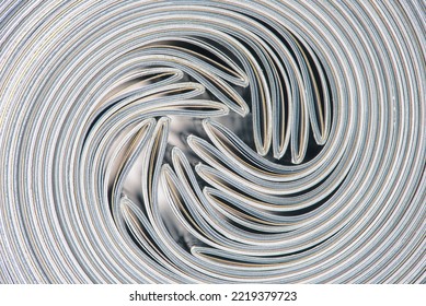 Edges of rolled magazines, top view - Shutterstock ID 2219379723