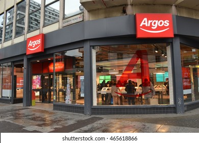 Edgware Road London November 2014; British catalogue retailer Argos store with shoppers visible inside the busy store