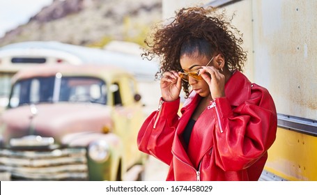 Edgy African American Model Posing In Red Jacket