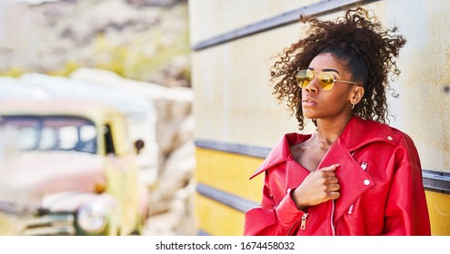 Edgy African American Model Posing In Red Jacket