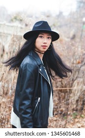 Edgy Asian Model Turning Around