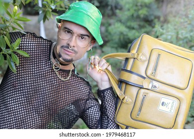 Edgy Man Holding Retro Leather Briefcase 