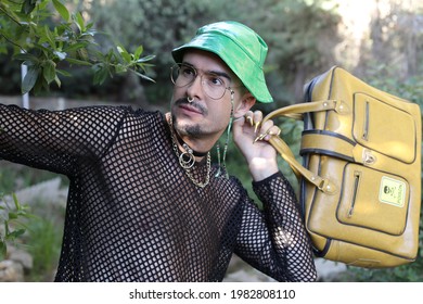 Edgy Man Holding Retro Leather Briefcase