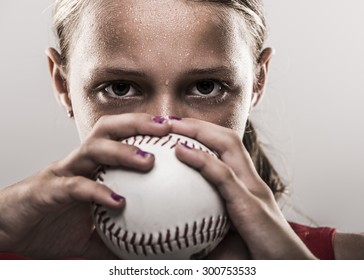 Edgy Softball Girl With Sweat Looking From Behind A Softball