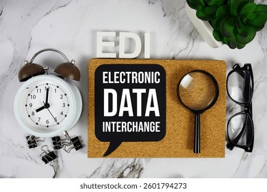 EDI - Electronic Data Interchange acronym with alarm clock and magnifying glass, business concept background