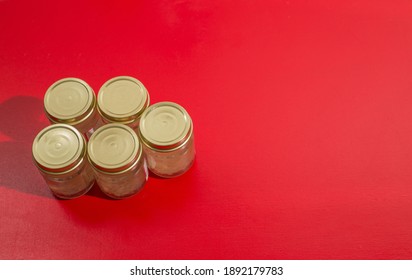 Edible Birds Nest Is Bird's Nest  Bottles. Edible-nest Swiftlet, With Copy Space And Red Background. 