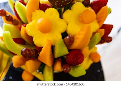 Edible Fruit Basket Arrangement With A Variety Of Fruits