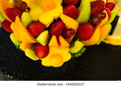 Edible Fruit Basket Arrangement With A Variety Of Fruits