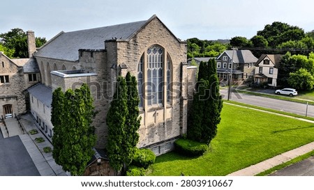 An edifice that appears to be built like a fortress but serves as a place to worship the Lord.
