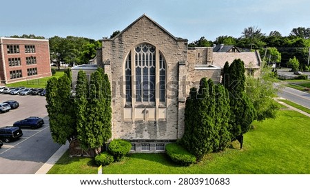 An edifice that appears to be built like a fortress but serves as a place to worship the Lord.