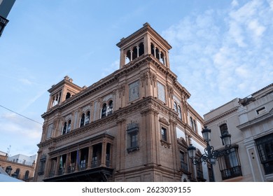 Edificio Coliseo, an iconic modern building in Seville, blending contemporary architecture with traditional Spanish design, located in the city center.