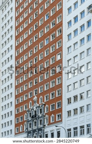 Edificio España facade with its unique architectural details and repetitive window pattern
