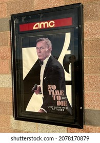 Edina, Minnesota, USA. November 19th, 2021. A poster in a frame on the exterior of a mall advertising the James Bond film currently in theaters called No Time To Die.