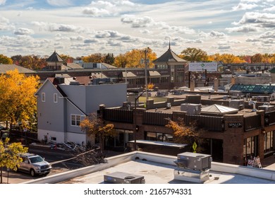 EDINA, MN - FALL 2021 - A High Angle Shot Overlooking a Suburban Shopping Center in Metropolitan Minnesota during a Gorgeous Autumn Afternoon