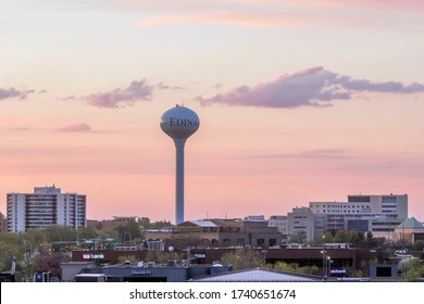 EDINA, MN - MAY 2020 - A Telephoto Close Up of the Edina Water Tower Against a Beautiful Spring Sunset Sky