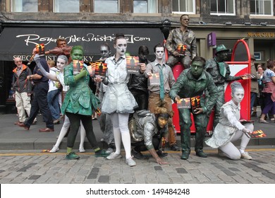 EDINBURGH- AUGUST 10: Members Of Babolin Theatre Publicize Their Show Sentinels During Edinburgh Fringe Festival On August 10, 2013 In Edinburgh, Scotland