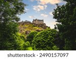 Edinburgh castle in the late evening light as seen from Princes Park. 