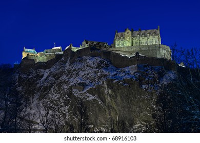 Edinburgh Castle, Scotland, UK, Illuminated At Dusk With Winter Snow