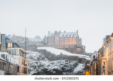 Edinburgh Castle as seen from Castle Street in New Town during a winter snowstorm in the city centre of Edinburgh, Scotland.