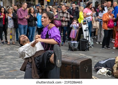 Edinburgh Festival Fringe 2022-5 Aug-29 Aug Edinburgh UK. Performers On The Street. Actors Of Street Theater And Musicians In Capitol Of Scotland. A Comedy Actors Perform On The Royal Mile.