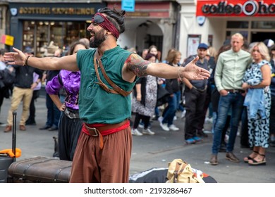 Edinburgh Festival Fringe 2022-5 Aug-29 Aug Edinburgh UK. Performers On The Street. Actors Of Street Theater And Musicians In Capitol Of Scotland. A Comedy Actors Perform On The Royal Mile.