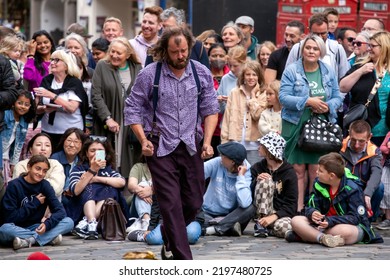 Edinburgh Festival Fringe 2022-5 Aug-29 Aug Edinburgh UK. Performers On The Street. Actors Of Street Theater And Musicians In Capitol Of Scotland. A Comedy Actor Performed On The Royal Mile. 