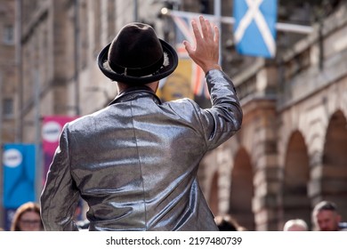 Edinburgh Festival Fringe 2022-5 Aug-29 Aug Edinburgh UK. Performers On The Street. Actors Of Street Theater And Musicians In Capitol Of Scotland. A Comedy Actor Performed On The Royal Mile. 