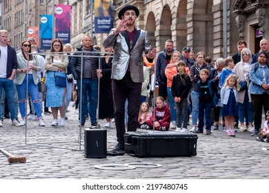 Edinburgh Festival Fringe 2022-5 Aug-29 Aug Edinburgh UK. Performers On The Street. Actors Of Street Theater And Musicians In Capitol Of Scotland. A Comedy Actor Performed On The Royal Mile. 