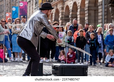 Edinburgh Festival Fringe 2022-5 Aug-29 Aug Edinburgh UK. Performers On The Street. Actors Of Street Theater And Musicians In Capitol Of Scotland. A Comedy Actor Performed On The Royal Mile. 