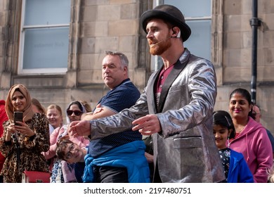 Edinburgh Festival Fringe 2022-5 Aug-29 Aug Edinburgh UK. Performers On The Street. Actors Of Street Theater And Musicians In Capitol Of Scotland. A Comedy Actor Performed On The Royal Mile. 