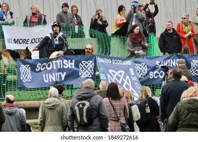 EDINBURGH, SCOTLAND - 07 November 2020 Public Speaker With Crowd Of People And Banners At An Anti Lockdown Protest Outside The Scottish Parliament