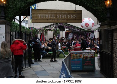 EDINBURGH, SCOTLAND - 18 June 2021 English And Scottish Supporters Watching The England V Scotland Euro 2020 Football Match At The Three Sisters Pub Beer Garden And People Queuing To Get In