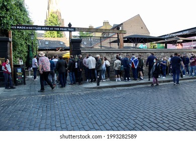 EDINBURGH, SCOTLAND - 18 June 2021 Scotland Supporters Queuing Outside The Pear Tree Pub Beer Garden To Watch The England V Scotland Euro 2020 Football Game