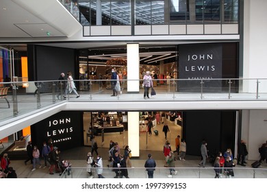 EDINBURGH, SCOTLAND - 26 June 2021 New Entrance to John Lewis Inside the Newly Open St James Quarter Shopping Centre and Shoppers Wearing Face Masks